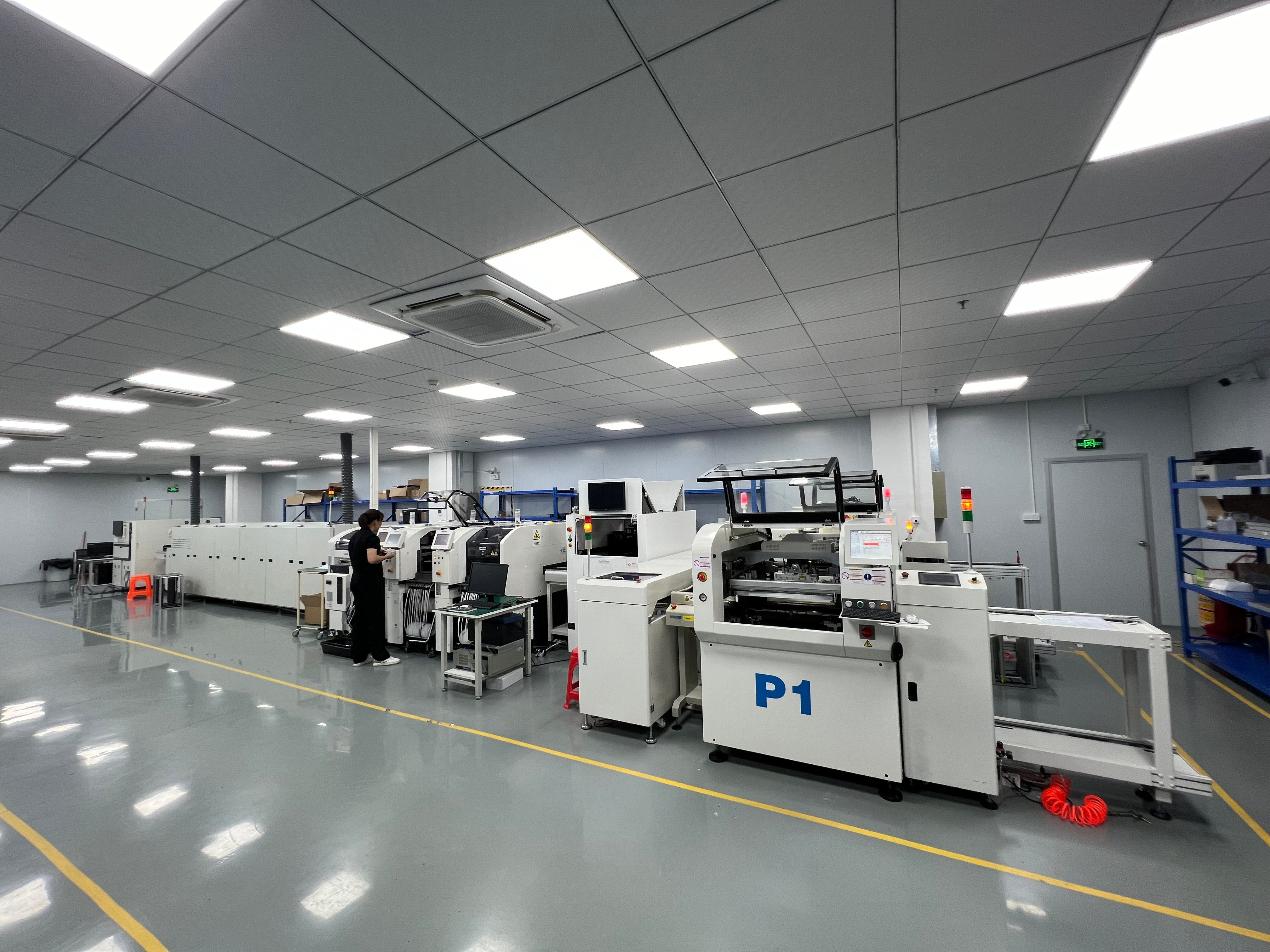 SMT production line with quality control operator